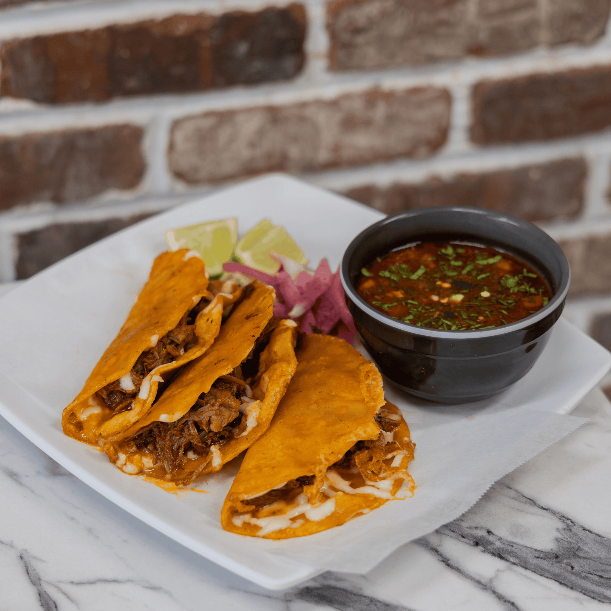 Birria Queso Tacos Plate.